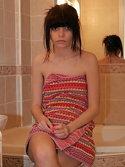 Petite 18yo teen relaxing & playing in hot bath